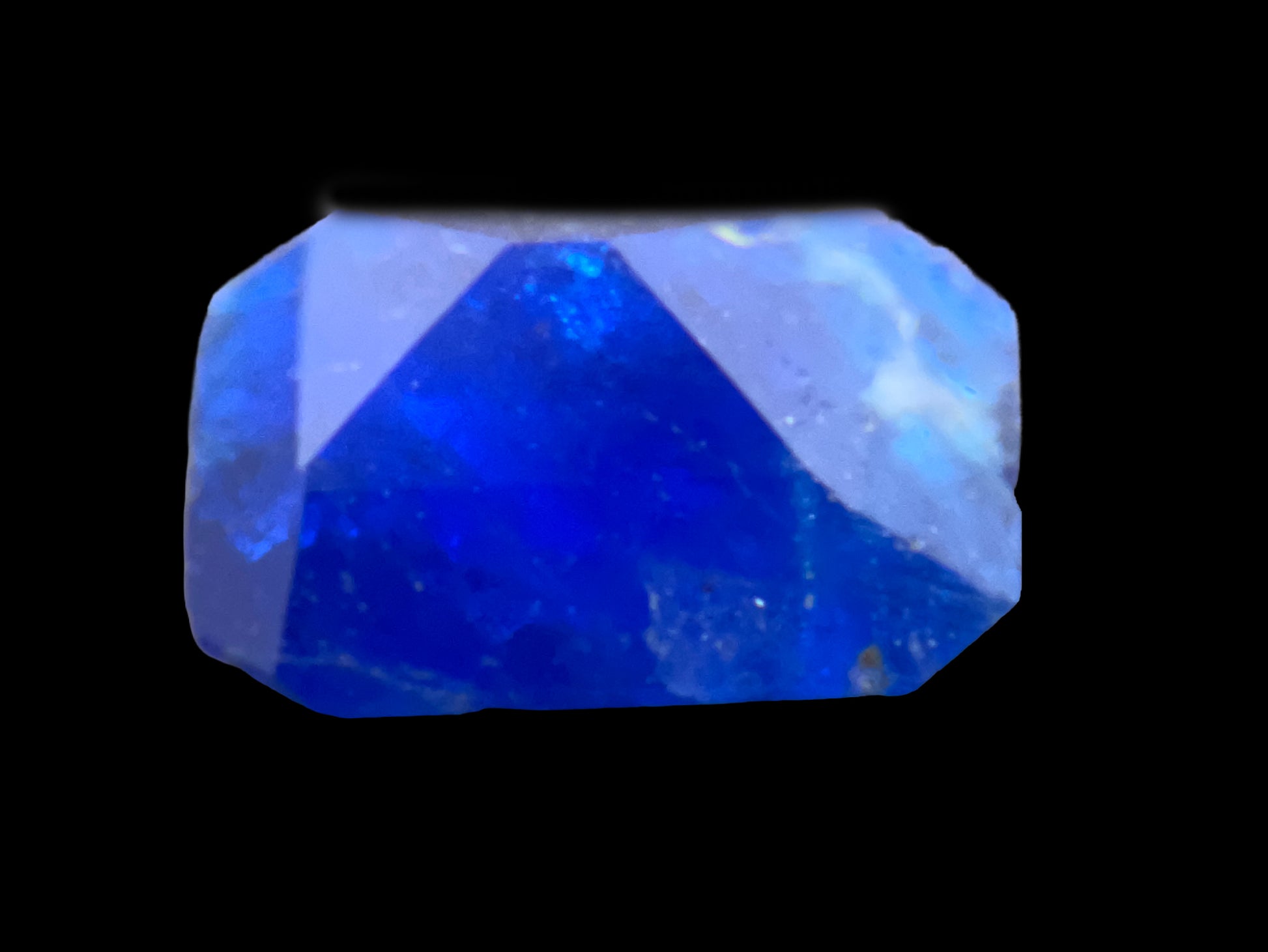 Blue crystal on a black background