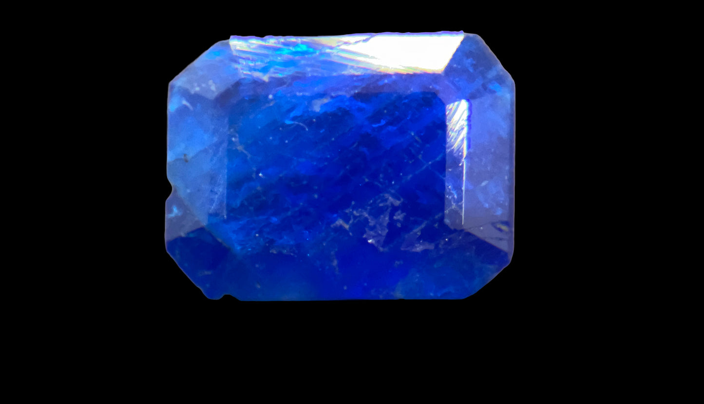 Blue gemstone on a black background